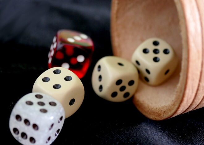 Are there advantages to momentum-based dice strategies?